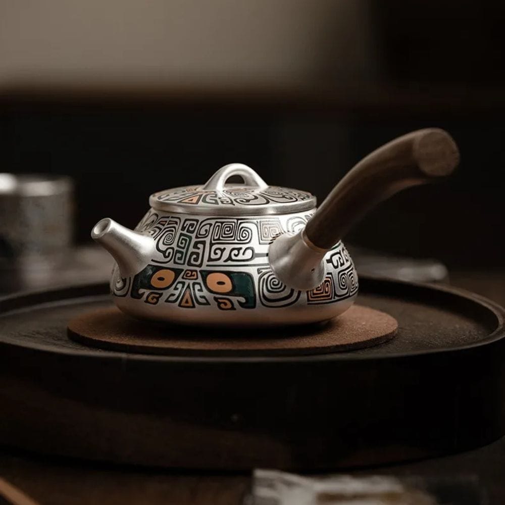 Théière artisanale en argent pur 999 300 ml avec manche latéral