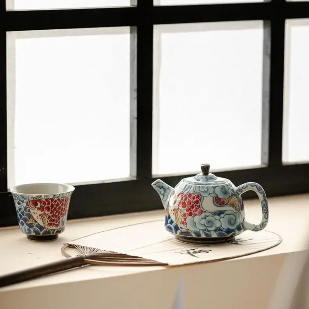 Théière en porcelaine décor sous glaçure 120 ml avec infuseur