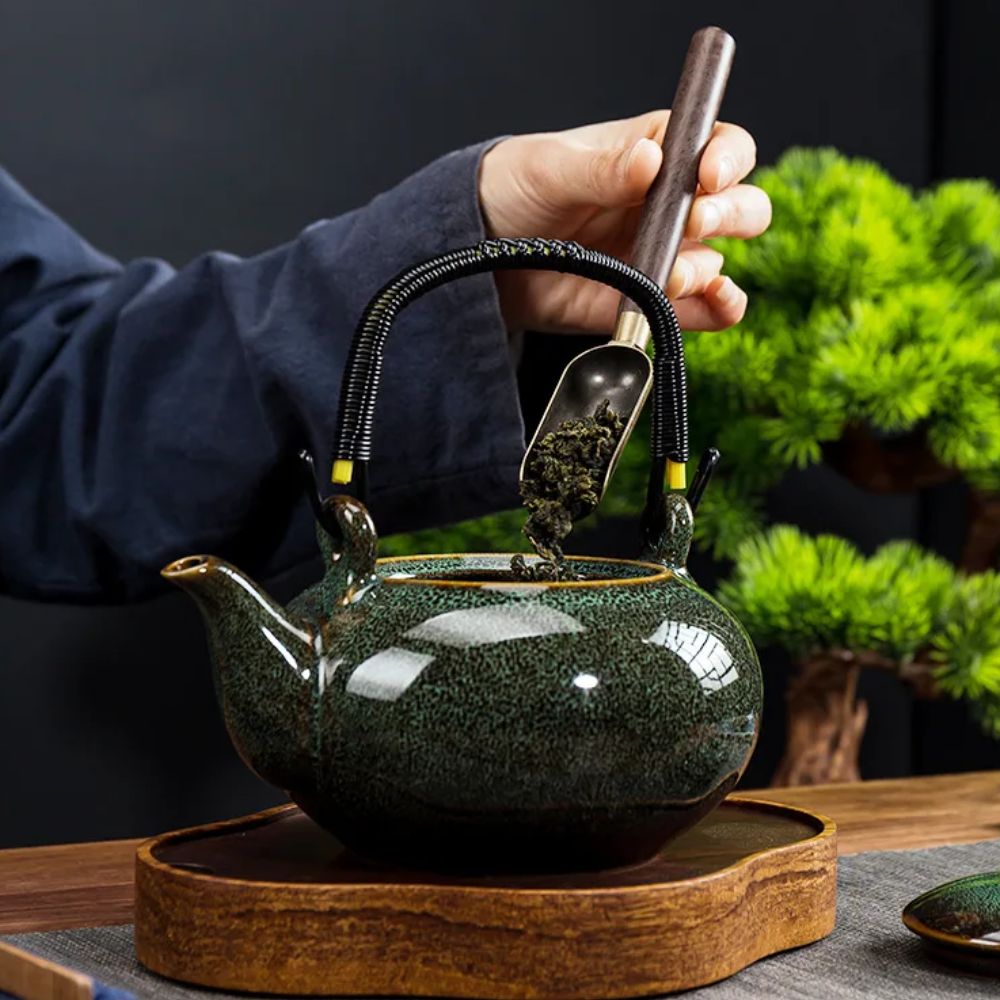 Théière en céramique Tianmu glaçure brillante anse levier