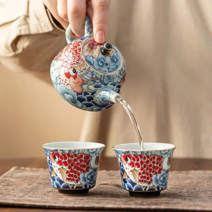 Théière en porcelaine décor sous glaçure avec infuseur