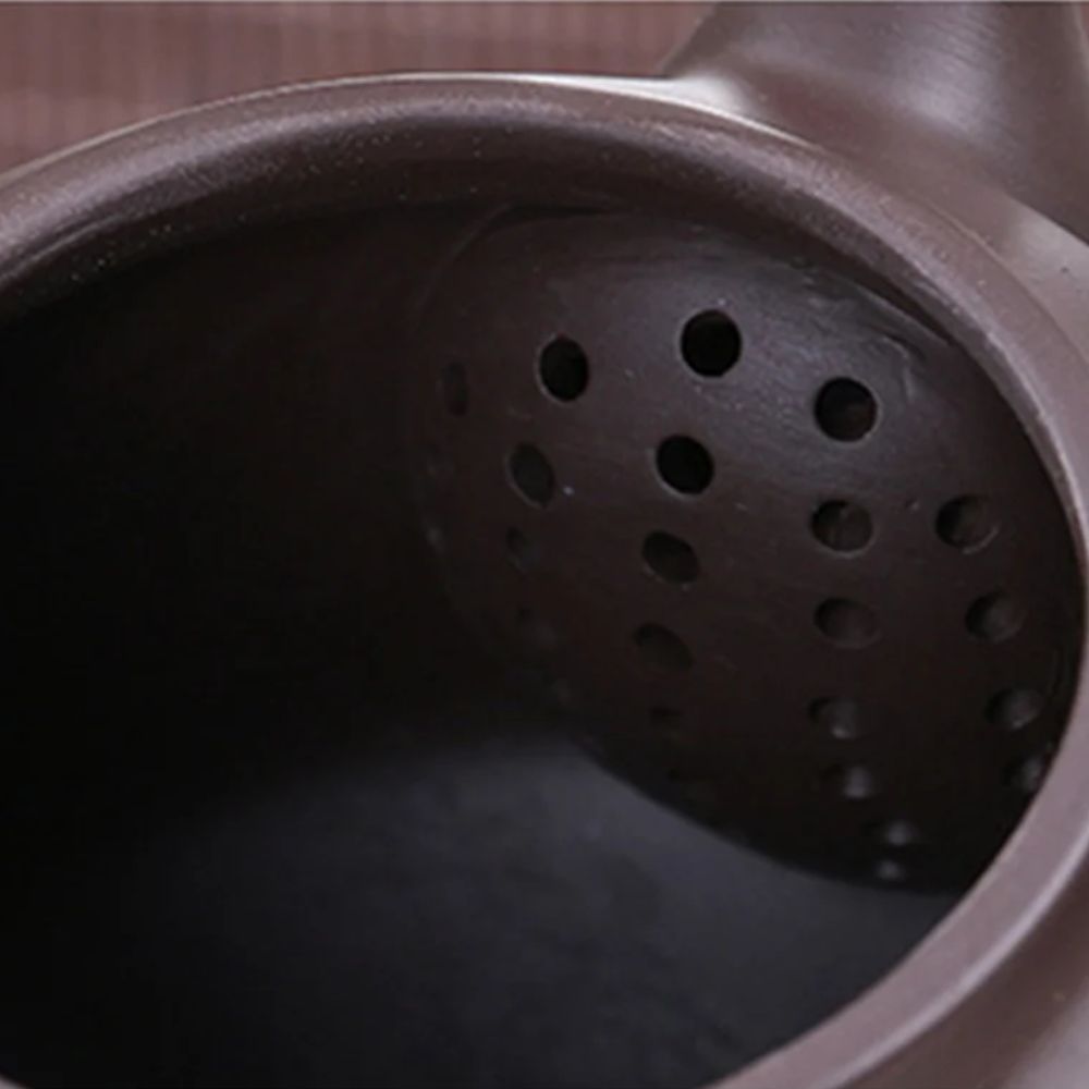 Théière artisanale argile violette