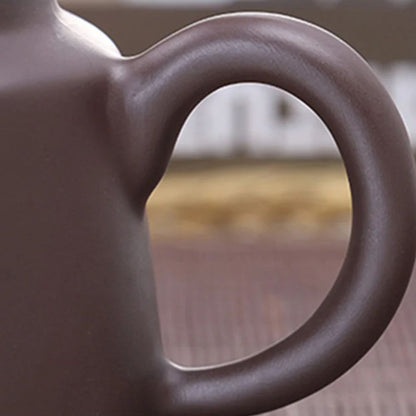 Théière artisanale argile violette