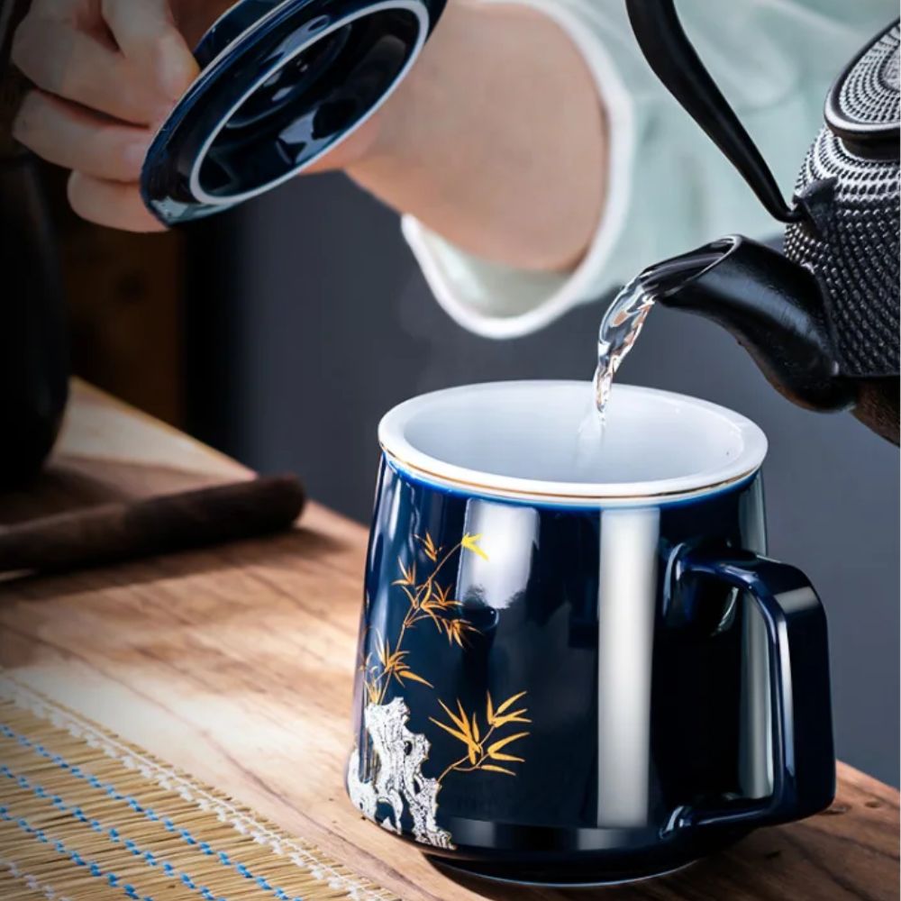 Tasse à thé en céramique avec filtre décor chinois