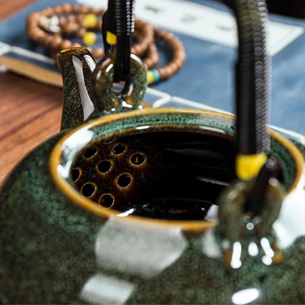 Théière en céramique Tianmu glaçure brillante anse levier