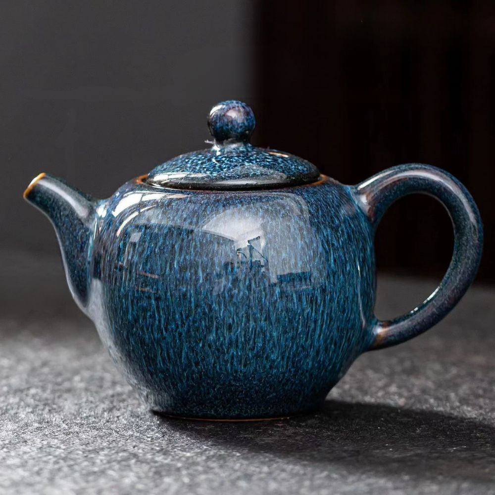 Théière en porcelaine émaillée étoilée