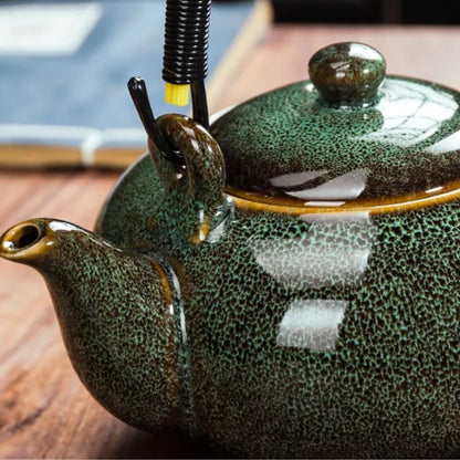 Théière en céramique Tianmu glaçure brillante anse levier