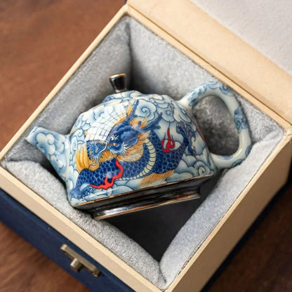 Théière en porcelaine décor sous glaçure avec infuseur