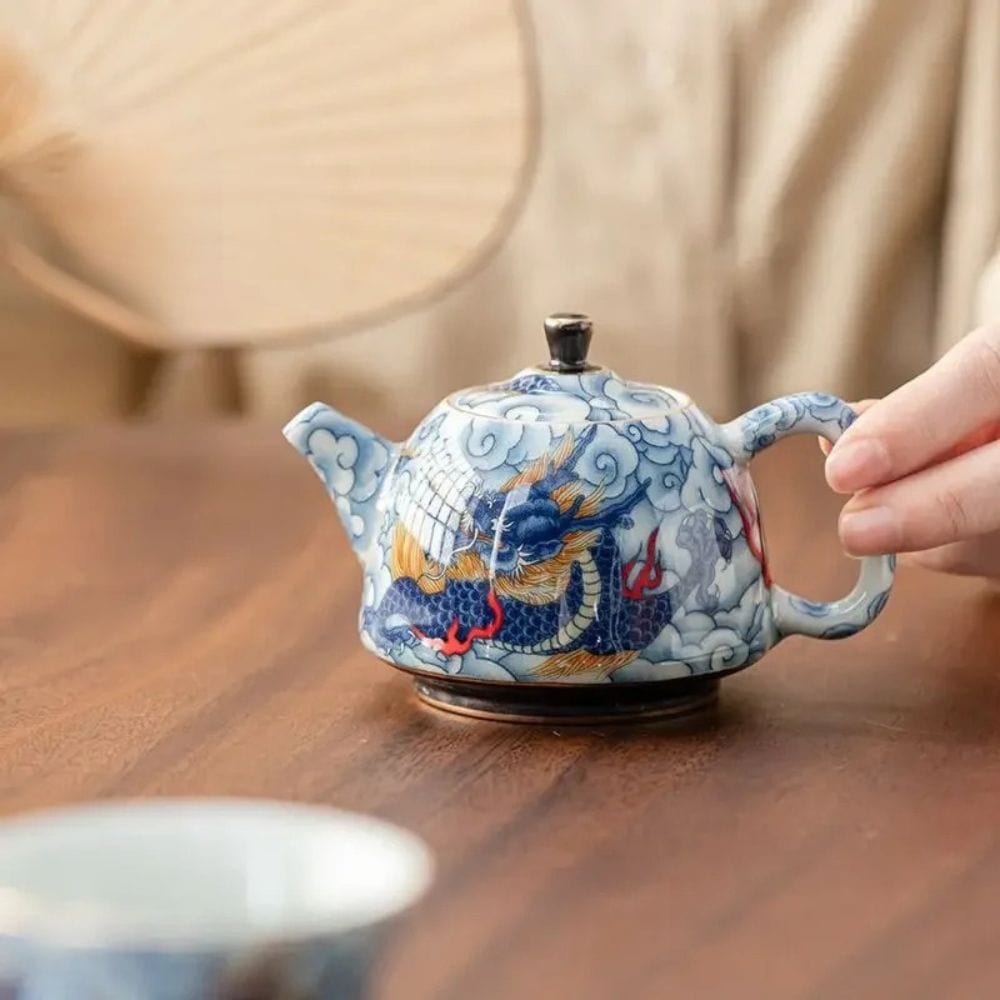 Théière en porcelaine décor sous glaçure 120 ml avec infuseur