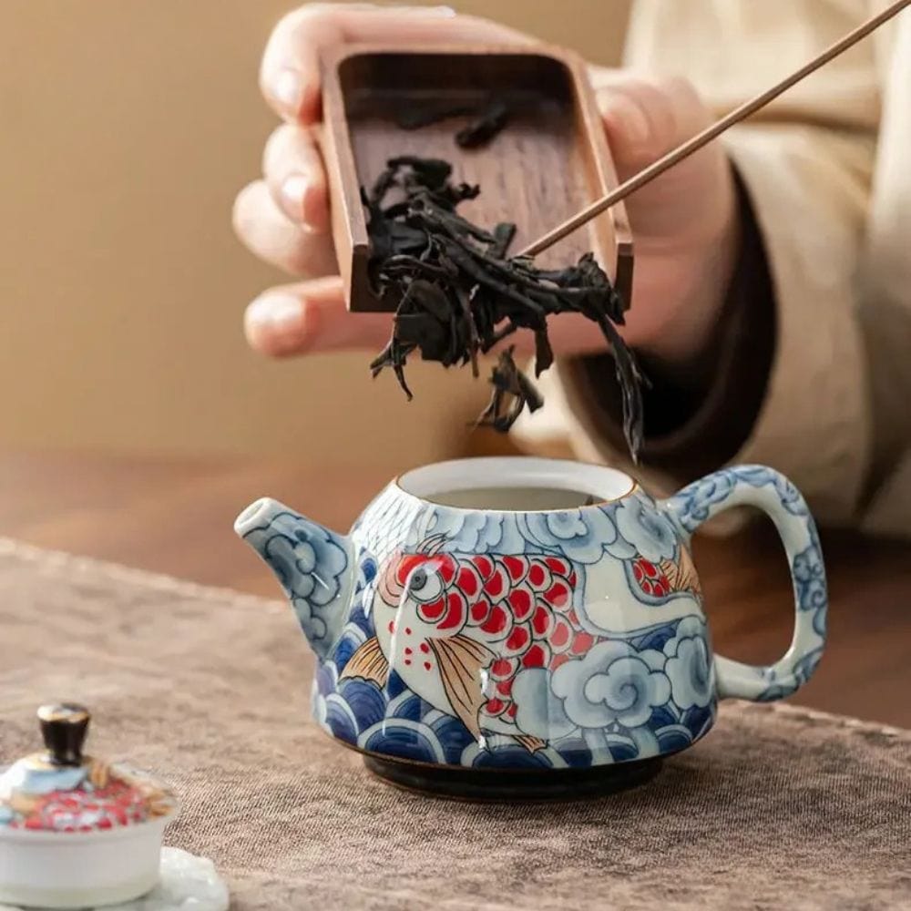 Théière en porcelaine décor sous glaçure 120 ml avec infuseur